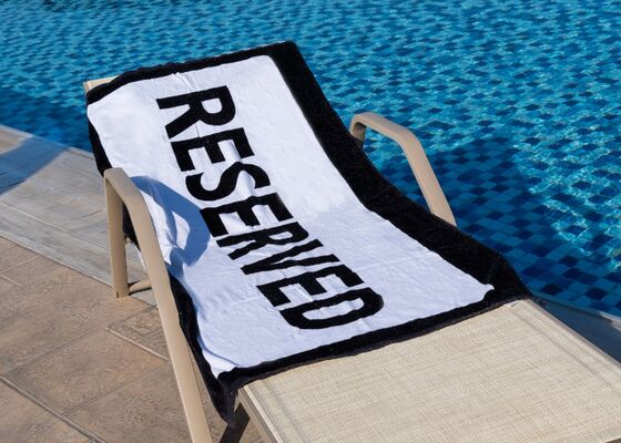 Handdoek reserveren zwembad verboden?